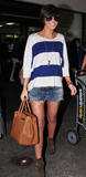 th_57860_The_Saturdays_Arriving_at_LAX_February_12_2012_15_122_35lo.jpg